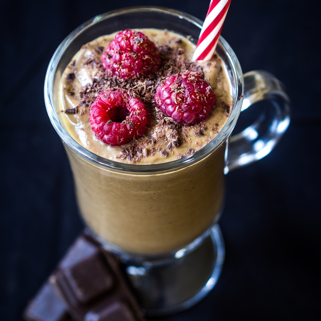 chocolate smoothie with nice raspberries on top