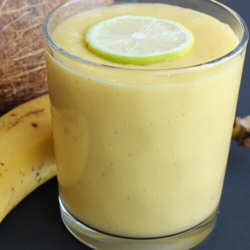 creamy smoothie with lemon on top