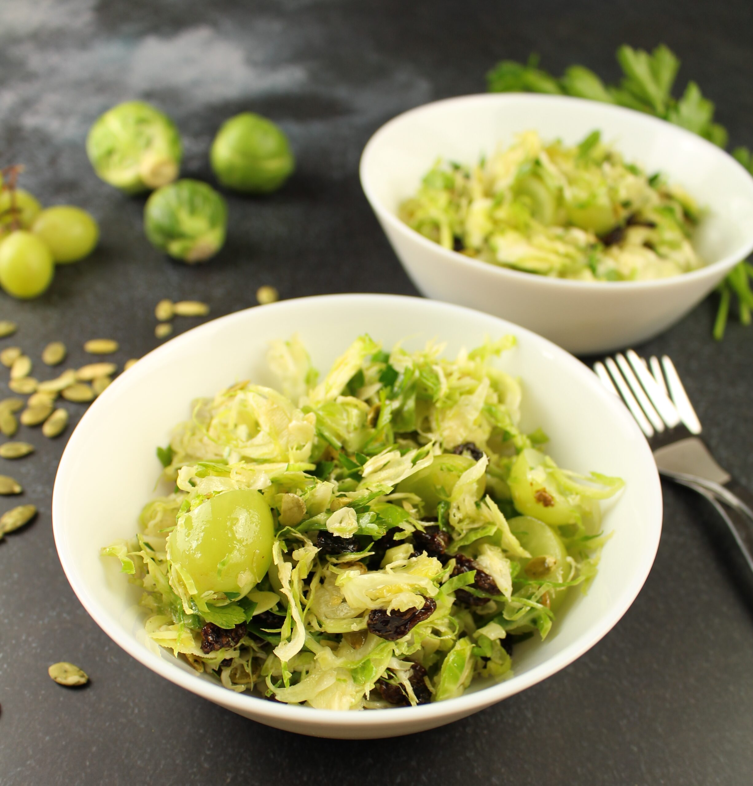 Brussels sprouts salad in a white bowl