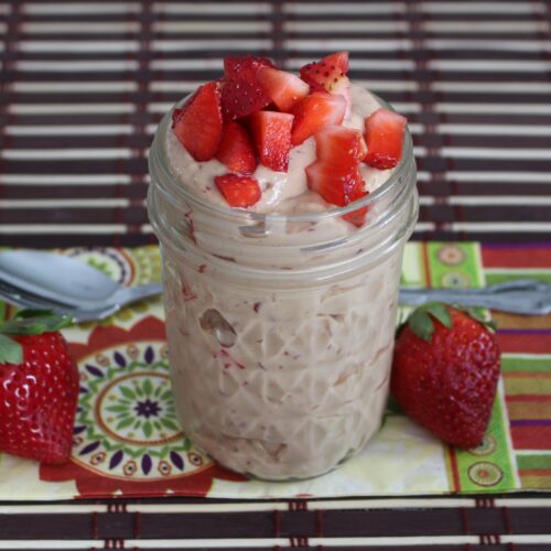 Vanilla smoothie with strawberries and cherries