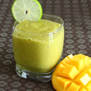 lime smoothie with mango on the side