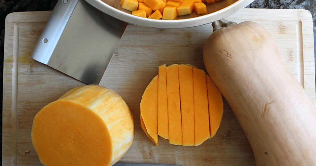 Butternut on a cutting board with knife